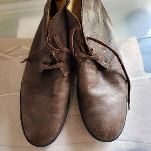 Tod's women's patent leather 3/4 boots.